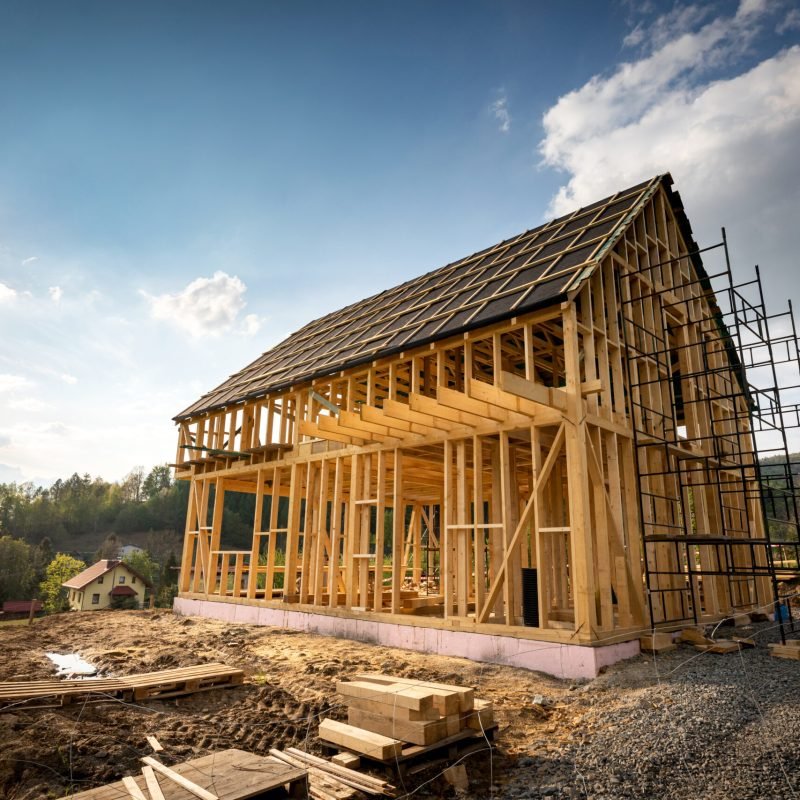 Residential home construction, frame wooden house outdoor